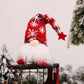 Décoration de Noël à suspendre : guirlande lumineuse avec des gnomes sans visage