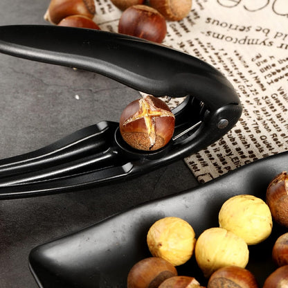 📢📢50 % DE RÉDUCTION !! ⏰Coupe-Châtaignes en Croix – Pince Ergonomique & Lame Crantée Inox for Ouvrir les Fruits à Coque en Toute Sécurité ✂️✨
